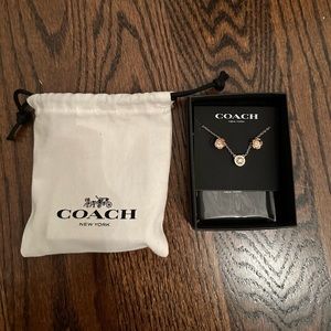 Coach Halo Tea Rose pendant necklace and earrings